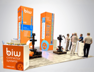 BIW Connector Systems exhibit booth design with orange towers
