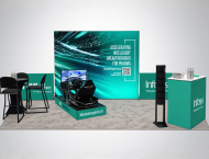 Infosys exhibit booth design with a racing simulator